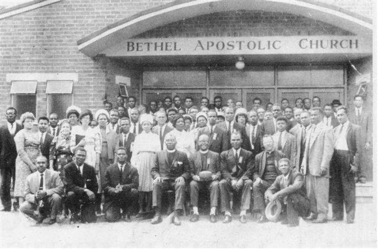 Bishop Saunders with the saints of First United outside a church in the 1960s